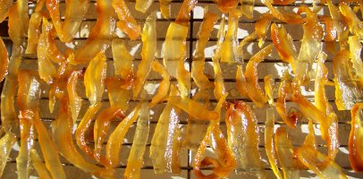candied citrus peel on drying rack