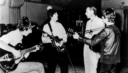 Harrison, McCartney and Lennon with George Martin